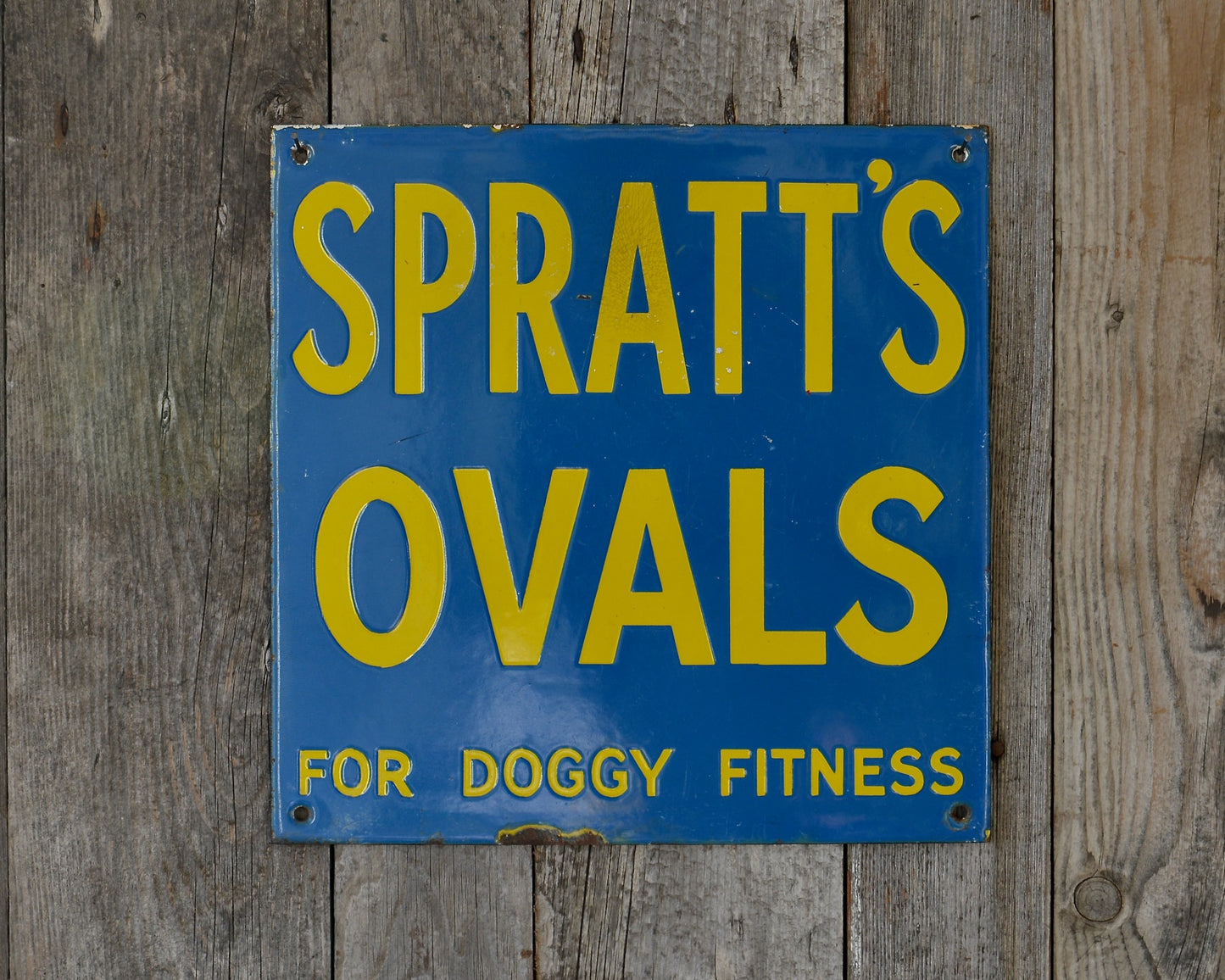 Spratts enamel advertising sign.