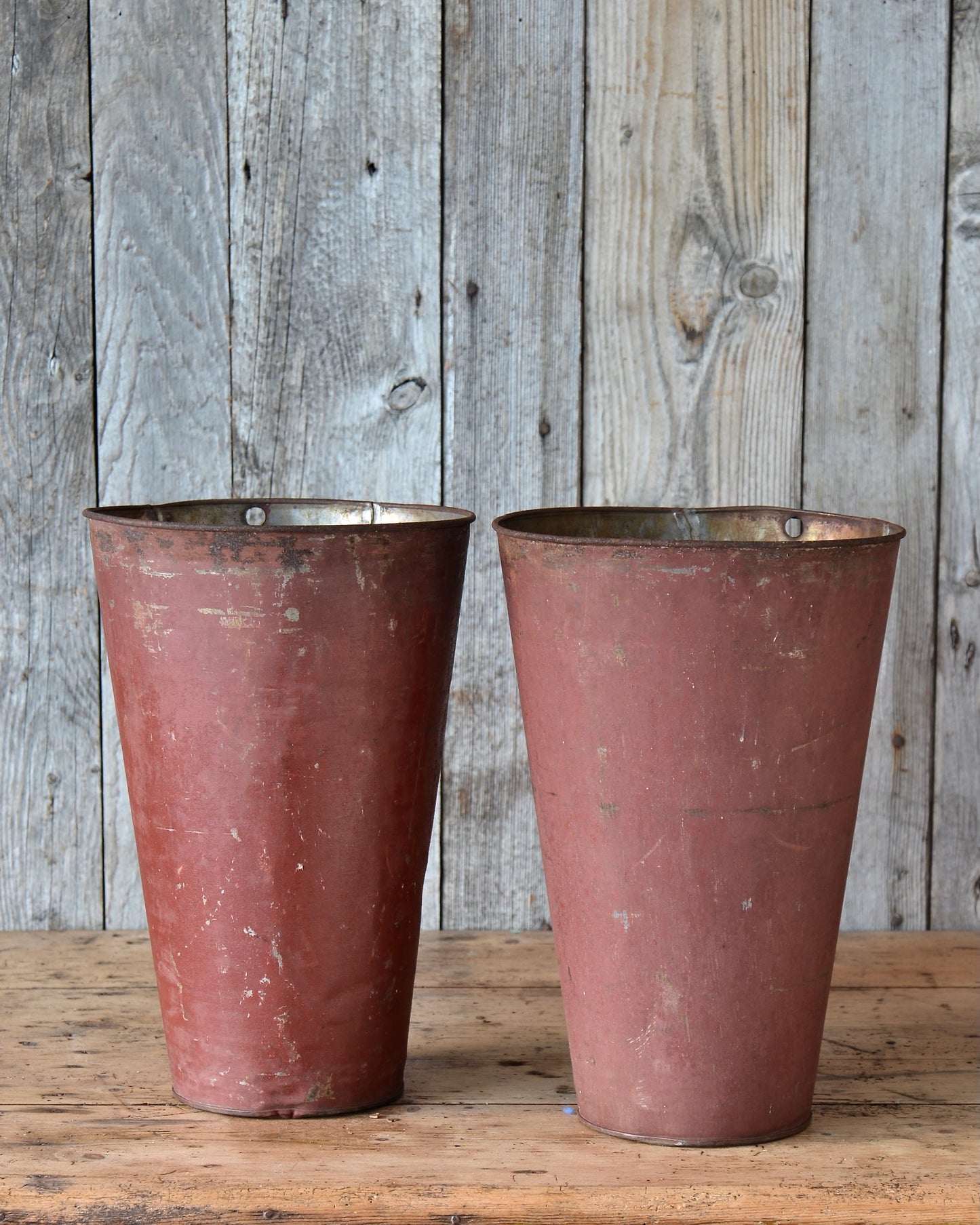 Two antique Maple syrup buckets.