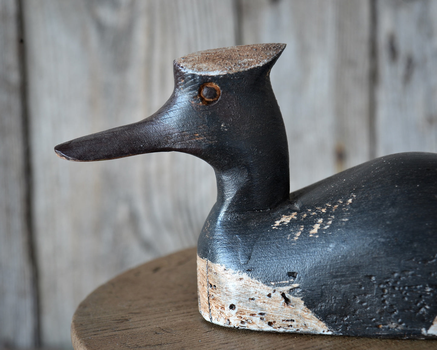Folk art Hooded Merganser carving.