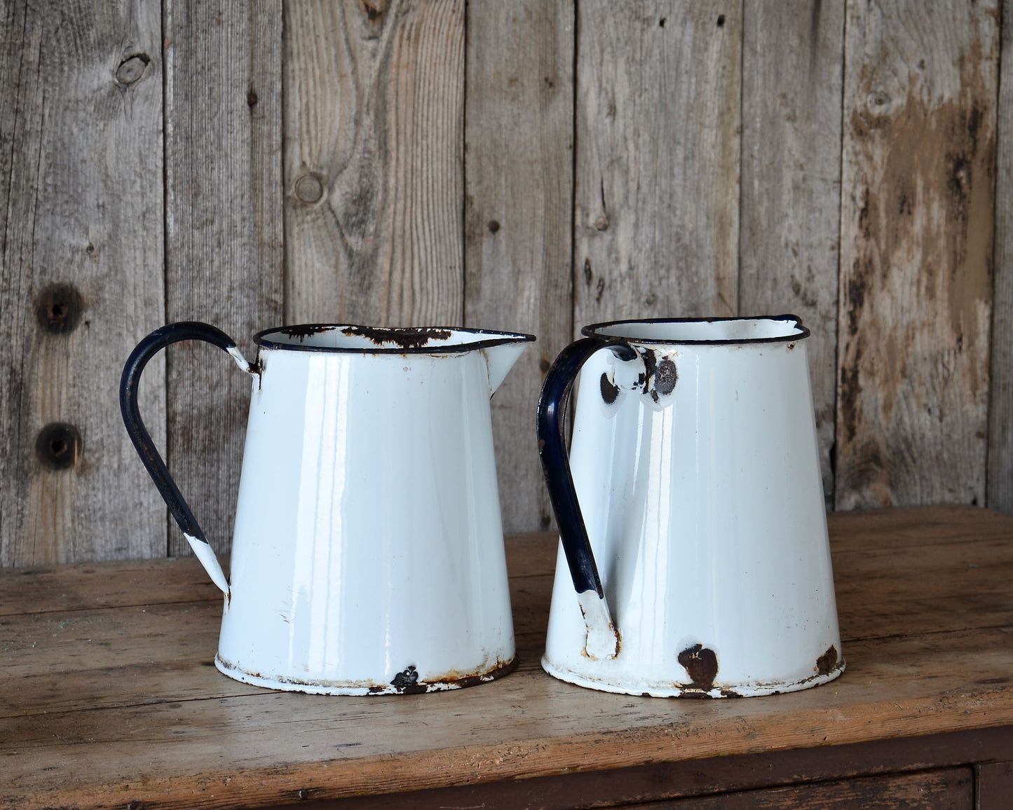Enamel jugs.