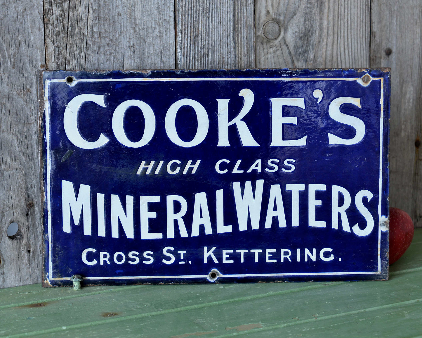 Enamel advertising sign.